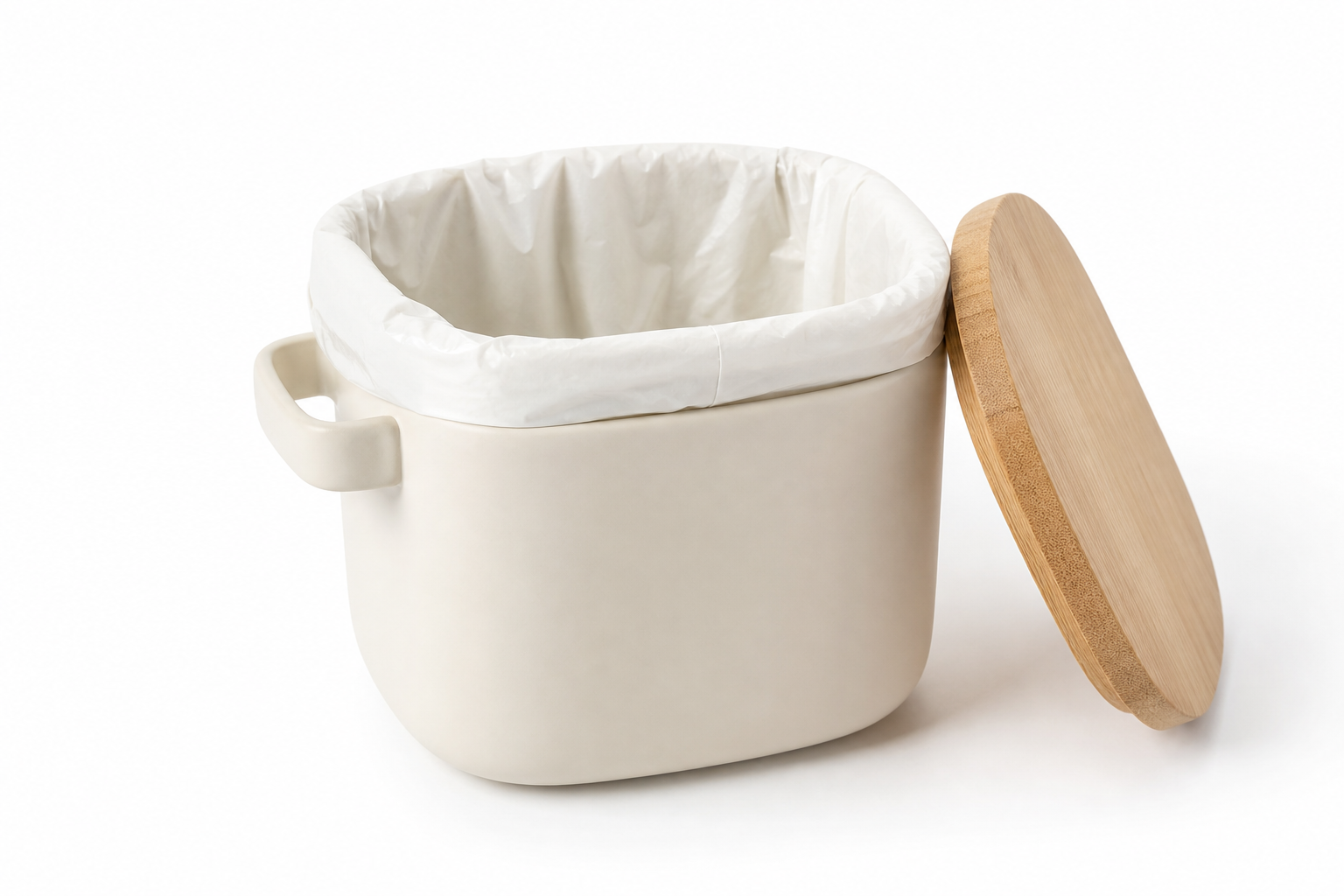 Ceramic bowls and wooden cutting boards arranged in a warm, minimalist kitchen.